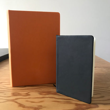 Le duo de carnets orange et noir